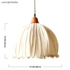 an image of a light fixture with measurements for the size and width, on a white background