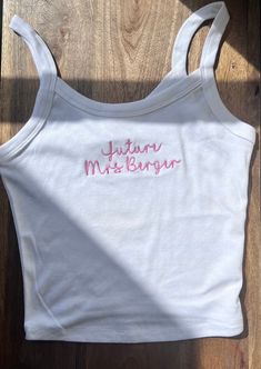 Stand out from the crowd and make a lasting impression with our Custom Embroidered Crop Top Tank. Perfect for team uniforms, bridal parties, bachelorette gifts, or retail merchandise! ✨Please note that my processing times are 2-3 weeks, and that does not include shipping time. Shipping time is an additional 3-5 business days, depending on the type of shipping you select at checkout. Please do not leave "need by" instructions in the notes, they will not be honored.✨ -52% cotton, 48% polyester. Th Tank Top Embroidery, Business Merch, White Tanks, Bach Weekend, Embroidered Tank Top, Promotional Giveaways, Embroidered Crop Tops, Embroidered Tank, Stitching Techniques