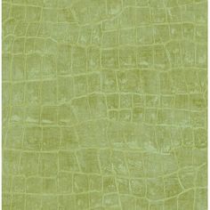 a green textured wallpaper with small squares