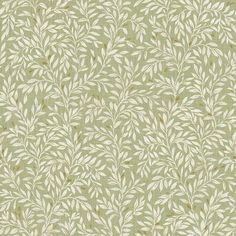 a green and white wallpaper with leaves on it