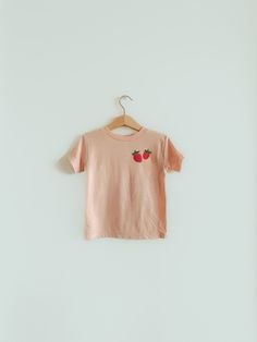 Handmade and designed kids' shirt with love by two mamas. FEATURES: - BEIGE COLOR 100% Cotton - PINK COLOR 50% polyester 25% Airlume combed and ring spun cotton, 25% rayon jersey, 40 single - Heat pressed design * Please order one size down when you purchase clothing color in pink and Olive green.  CARE: - Turn the garment inside out and machine wash cold separately from other clothes - Use color-safe detergent - Do NOT bleach - Air dry or turn inside out and dry on low. - Do NOT iron on the des Pink And Olive Green, Toddler Baby Boy, Toddler Birthday Gifts, Heat Press Designs, Toddler Birthday, Pocket Tshirt, Toddler Gifts, Kids Tops, Boy Girl