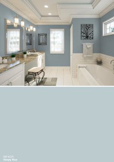 a bathroom with gray walls and white trim on the ceiling is shown in this image