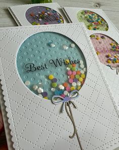 a handmade birthday card with balloons and confetti on the front, which reads best wishes