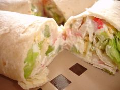 a close up of a burrito cut in half