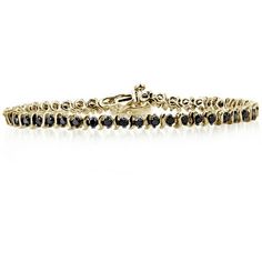 This absolutely stunning 2 ct. t.w. genuine black diamond bracelet in sterling silver is the perfect finishing touch for a romantic evening look. Turn heads as you saunter down the street while the jaw-dropping, genuine black diamonds bring out a dazzling shine, adding just the right amount of bling. This lovely bracelet will sparkle endlessly in the moonlight, showcasing each gorgeous diamond. Be ready to add undeniable glamour to your evening look with this basic yet brilliant wrist piece.Black diamonds are denser and weigh more than white diamonds. Therefore, black diamonds may appear substantially smaller than white diamonds of the same carat size. Size: One Size.  Color: Gold.  Gender: female.  Age Group: adult. Classic Black Diamond Bracelet For Formal Occasions, Elegant Black Diamond Round Bracelets, Timeless Black Diamond Jewelry For Formal Occasions, Elegant Black Diamond Round Bracelet, Classic Round Black Diamond Bracelet, Elegant Bracelet With Black Diamonds, Formal Tennis Bracelet With Black Diamonds, Elegant Black Tennis Bracelet For Anniversary, Timeless Formal Jewelry With Black Diamonds