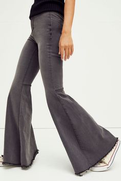 Just Float On Flare Jeans | Free People Classic Jeans With Frayed Hem For Fall, Classic Cotton Flare Jeans, Stretch Washed Pants For Fall, Stretch Washed Jeans, Stretch Washed Full-length Jeans, Spring Washed Flare Bottoms, Flare Jeans With Five Pockets For Fall, Stretch Flare Bottoms Washed, Stretch Flare Washed Bottoms