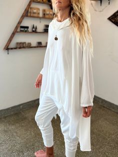 Gorgeous free-flow loose rayon/cotton top for intentional gatherings and practices 🤍 This oversized shirt can be worn as a Ceremony or Kundalini white piece as well as a part of a nomadic festival outfit. Designed by our Moroccan friends from LA this piece truly resembles the nomad lifestyle. We fell in love with its comfy feel and are honored to add it to our “Ceremony White” collection of pieces created with intention to support you on your journeys Within and connecting to the Higher Self. T Nomad Lifestyle, Harem Pants Women, Goddess Dress, We Fall In Love, Cotton Top, Fell In Love, Festival Outfit, Oversized Shirt, White Top