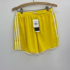 Adidas Tastings 17 Soccor Shorts Color: Yellow/White Size: Large Waist: 14 1/2in Inseam: 7in (Approx Measurements) -Regular Fit -Elastic Waistband -Drawstring Cord -Climacool -Mesh Inserts Are Sides -Piping On Hem New With Tags C72 Sporty Adidas Shorts, Sporty Yellow Athletic Shorts With Short Leg, Yellow Moisture-wicking Short Bottoms, Moisture-wicking Yellow Shorts, Yellow Moisture-wicking Shorts, Yellow Sporty Athletic Shorts, Casual Yellow Moisture-wicking Shorts, Sporty Yellow Athletic Shorts, Yellow Moisture-wicking Bottoms For Spring