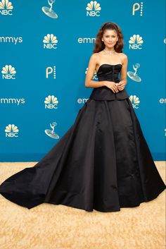 the actress poses in her black gown at the 70th annual golden globe awards on march 25, 2013 in beverly, california