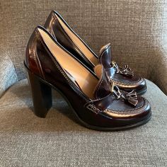 Size 8b, 4 Inch Heel Gold Hardware And Tassel On Front Gently Worn Only A Few Times Deep Wine Colored Leather And Black Heels Questions? Leave A Comment Below! Fall Formal Heels With Round Toe, Formal Heels With Stacked Heel And Round Toe, Formal Stacked Heel Heels With Round Toe, Elegant Formal Purple Loafers, Elegant Purple Formal Loafers, Elegant Purple Leather Loafers, Elegant Purple Slip-on Loafers, Formal 4-inch Heel Slip-on Heels, Burgundy Patent Leather Heels With Round Toe