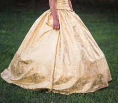 "This is a beautiful full skirt that can be made from satin, taffeta, or lame. Perfect for any costume it has a waistband we make to your measurement and laces up the back giving you a great fit. These are very full with plenty of room for a hoop skirt or a crinoline or both. Averaging 150\" wide at the bottom and hemmed to your length. This is great for any princess costume based on the color you pick and either a great starter piece or perfect for fleshing out your existing wardrobe. All purch Princess Style Satin Ball Gown For Pageants, Princess Style Satin Ball Gown, Princess Style Fitted Gold Ball Gown, Gold Fitted Princess Ball Gown, Fitted Fairytale Ball Gown For Pageants, Princess Style Gold Ball Gown, Fitted Gold Ball Gown For Debutante Ball, Hoop Skirt, Princess Costume