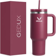 a red travel mug next to a box with the logo gedux on it