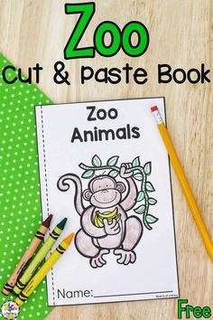 the zoo cut and pastee book with two pencils next to it