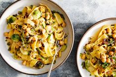 two plates of pasta with broccoli and chickpeas