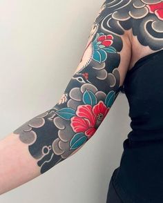 a woman with a tattoo on her arm