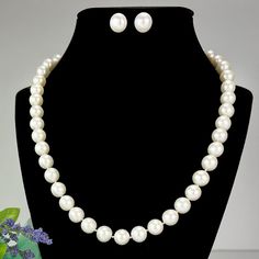 Description  Material  : Genuine Freshwater Pearl Length   : 17 Inches Shape      :  Round   Bead Size:  9.5mm-10mm Color       :  Natural White  Closure    : Pearl Clasp  This classic style is evergreen and can be worn on many party or everyday outfits. Try it out for yourself.  A Brand you can always Trust. PERFECT FOR GIFTING : These elegant pearls make the perfect gift for Mother's Day, Valentine's Day, Christmas, Hannukah, Birthdays, Engagement, Brides, Bridesmaids or Graduation for any wom White Jewelry For Mother Of The Bride, Classic Jewelry Sets With Round Beads As A Gift, Classic Round Jewelry For Mother Of The Bride, White Round Beads Jewelry For Mother Of The Bride, Classic Pearl Jewelry Sets For Anniversary, Elegant Pearl Jewelry Sets With Round Beads, Classic White Jewelry Sets For Wedding, Classic White Round Jewelry Sets, Classic Pearl Jewelry Sets