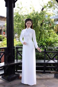 🌿 This set includes traditional Ao Dai, pants. Style: Traditional Material: Very well made with high-quality silk Collar: traditional collar Please provide bust-waist-and hip measurements when placing your order to ensure the best fit for you. 🌿 NOTE: * Recommend gentle washing * Please contact us for any inquiries about size. We don't have an exchange policy for the wrong size * It is safe for a washer and dryer in a "delicate" setting. * Actual Ao Dai colors may differ up to 10% due to light Traditional White Ao Dai For Formal Occasions, Traditional Long Sleeve Ao Dai For Banquet, Traditional White Ceremonial Dress, Traditional Fitted White Wedding Dress, Elegant Wedding Dress For Traditional Ceremonies, Fitted White Ao Dai For Ceremonies, Elegant Long Sleeve Ao Dai For Traditional Ceremonies, Elegant Fitted Ao Dai For Traditional Ceremonies, White Embroidered Ao Dai For Wedding