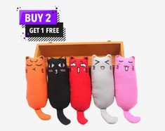 four different colored cats in a box with the caption buy 2 get 1 free