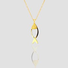 Discover the elegance of simplicity with our exclusive 14K solid gold Fish Necklace, a stunning piece of jewelry that effortlessly blends style and sophistication. fish necklace charm size: around 12mm-13mm *  around 7mm-8 mm  chain length: about  42 centimeters Material: 14k solid gold and also 10k and 18k gold Style: Minimalism. My product is crafted by hand, employing traditional sawing techniques to shape it. Please note that due to the handmade nature of the process, the final shape may var Luxury Gold Fish-shaped Necklace, Gold Fish Necklace, Handmade Pearl Necklace, Abalone Necklace, Fish Necklace, Minimal Necklace, Seashell Jewelry, Gold Fish, Gold Initial