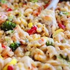 a skillet filled with macaroni and vegetables