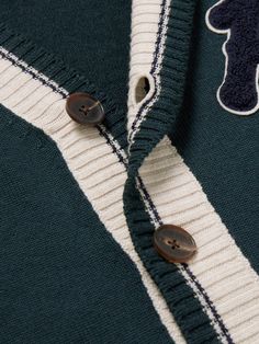 DESIGNED BY MR PORTER. Golf attire through the ages is the inspiration for Mr P.'s new line. This cardigan is knitted from fine merino wool for a relaxed fit so it's easily layered over polo shirts. It's finished with striped ribbed trims and a sporty 'P' appliqué. Lower Impact Materials. This product is made using at least 50% lower-impact materials or ingredients. Find out more about our Consciously Crafted criteria here. Golf Vest, New Line, Wool Cardigan