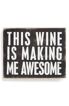 this wine is making me awesome sign on a white background with the words,'this wine is making me awesome '