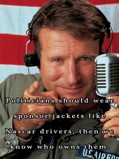 a man in uniform holding a microphone with an american flag behind him and the caption says politicians should wear sponsor jackets like naser drivers, then we know how to own them