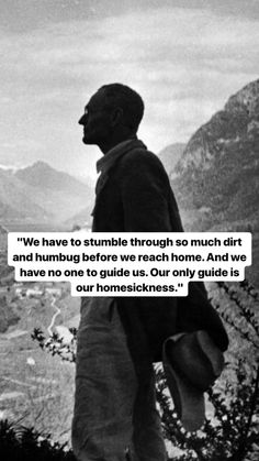 a man standing on top of a mountain with a quote above him that reads, we have to stumble through so much dirt and humbug before we reach home