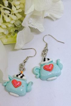 Cutesy Retro Alice in wonderland Earrings, jewellery, all so cute. Resin earrings, dangly earrings.  Also available in mystery box 📦  All orders receive a free gift Cute Jewellery, Retro Earrings, Mystery Boxes, Retro Earring, Dangly Earrings, Resin Earrings, Mystery Box, Free Gift, Alice In Wonderland