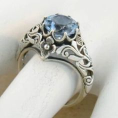 "Vintage Estate \"SCOTTISH THISTLE\" 2.00 Carat Simulated Aquamarine Solitaire Filigree Ring In 925 Solid Sterling Silver. Stamped 925." Exquisite Blue Topaz Ring For Anniversary, Elegant White Gold Flower Ring With Birthstone, Elegant Hallmarked Sterling Silver Engraved Ring, Heirloom Style Silver Sapphire Ring, Heirloom Silver Sapphire Ring, Classic Round Gemstone Flower Ring, Elegant Sterling Silver Engraved Hallmarked Ring, Classic Silver Flower Ring As Gift, Silver Sapphire Ring With Intricate Design