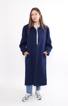 Hi! Welcome to TARASCOMMON.ETSY.COM, your destination for unique clothing from the 20th century! This listing includes a 80s button front wool coat in blue color design. This overcoat is perfect for adding a touch of retro charm to your wardrobe. Key Features: 80s minimalist overcoat Vintage style wool coat Size: M/L. Measurements (taken seam to seam while lying flat): Sleeve: 38cm / 14.96inch (armpit to end of sleeve) Width: 55cm / 21.65inch Length: 115cm / 45.27inch Material: WOOL/ VISCOSE. Ad Blue Wool Coat With Buttons, Blue Wool Coat With Button Closure, Blue Wool Coat With Buttons For Fall, Oversized Blue Vintage Outerwear, Vintage Oversized Blue Outerwear, Vintage Button Closure Peacoat For Fall, Wool Overcoat, Unique Clothing, Unique Outfits