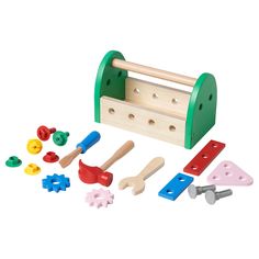 a wooden toy set with tools and pegs