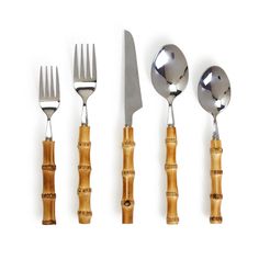 an assortment of silverware including forks, knives and spoons on a white background