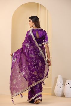 Go for this beautiful purple embroidered organza saree at parties and festive occasions. The saree comes with an embroidered blouse. Shop designer saree online in USA from Pure Elegance. Disclaimer: The actual product may vary slightly from the image. These are custom orders, hence expect slight variation in color, placement of the motif or buta. ESTIMATED DELIVERYBecause this is a custom order, it would take about 4 weeks from the date of purchase. RETURN POLICYThis product is a custom order an Purple Pre-draped Saree With Zari Work For Celebration, Bollywood Style Purple Art Silk Pre-draped Saree, Purple Dola Silk Pre-draped Saree, Purple Art Silk Pre-draped Saree For Navratri, Purple Chanderi Pre-draped Saree For Wedding, Purple Georgette Pre-draped Saree For Festivals, Embroidered Purple Georgette Pre-draped Saree, Purple Tissue Silk Pre-draped Saree With Sheer Dupatta, Purple Georgette Pre-draped Saree For Eid