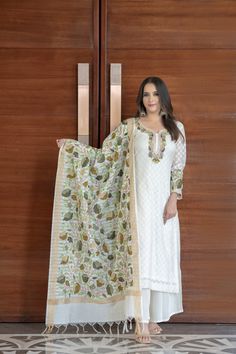 Step into the realm of sophistication with our Self Jacquard Cotton Kurta, Palazzo, and Dupatta set. The kurta features beautiful multi-color embroidery on the sleeves and neckline, while the all-over Aari embroidered dupatta adds a touch of traditional charm. Embrace comfort and elegance with this captivating ensemble for any occasion. Experience the Magic of Threads with Angad Creations 🧵✨ Embrace the Beauty of Kashmiri Embroidery, Intricate Motifs & Floral Patterns, Unveiling the Artistry of Embroidered Fashion - - - - - - - - - - - - - - - - - - - -  Product Details - Condition: Brand New (made to order) - Collection: Magic Of Threads - Style: Straight Kurta Palazzo & Dupatta set - Embroidery: Kashmiri Aari Work - Colour: White - Embroidery Colour: Multi-Colour - Care Instructions: Dr Kashmiri Dress, Outfit Traditional, Traditional Kurta, Kurta Palazzo Set, Taking Measurements, Palazzo Set, Dress Indian, Dupatta Set, Indian Dress