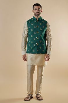 Green cotton silk bundi jacket with floral print. Comes with beige pant and a kurta. - Aza Fashions Spring Designer Cotton Silk Nehru Jacket, Spring Cotton Nehru Jacket With Zari Work, Unstitched Cotton Nehru Jacket For Spring, Fitted Cotton Silk Nehru Jacket For Spring, Fitted Nehru Jacket In Cotton Silk For Spring, Green Cotton Nehru Jacket For Diwali, Kurta Set Men, Floral Lehenga, Nehru Jacket