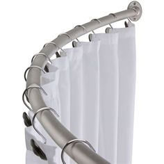 an image of a curtain rod attached to the side of a window with white curtains