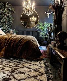 a bedroom with a bed, mirror and plants