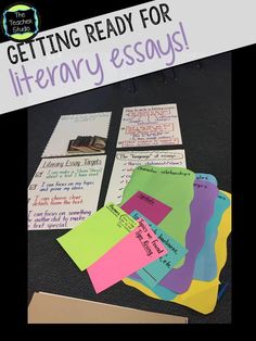 a pile of papers sitting on top of a table next to a sign reading getting ready for