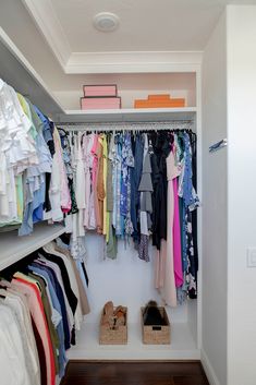 an organized closet with clothes and shoes