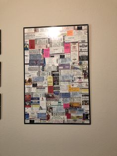 a wall covered in newspaper clippings next to a white wall with pictures on it