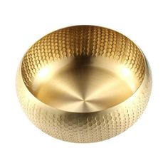 a gold metal bowl on a white background