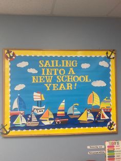 a bulletin board that says sailing into a new school year