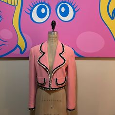 Be Retro Glam Wearing This Pink And Black Jacket By Moschino. Vintage Fashion At Its Best. Signs Of Wear Include Pricks In The Fabric And Some Areas On The Off White String That Have Dirt. Small Spot On Front Above Pocket. Size 6 Across Chest - 17 1/2 Across Waist - 15 1/2 In. Shoulder To Hem - 18 In. Shoulder To Shoulder - 16 In. Shoulder To Cuff - 23 In. Material: 50% Acetate 50% Rayon Made In Italy Black Crop Jacket, Moschino Vintage, Moschino Jacket, Cropped Black Jacket, Retro Glam, Moschino Cheap And Chic, Chic Pink, Black Crop, Pocket Size