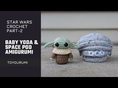 two crocheted yoda and space pod amigurmi toys sitting next to each other