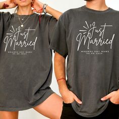 two people wearing t - shirts that say just married