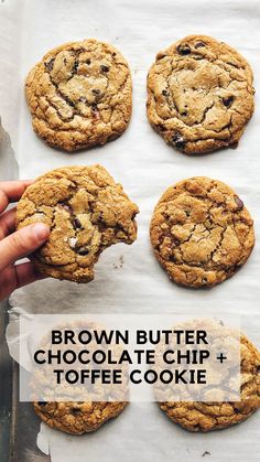 chocolate chip and toffee cookies on parchment paper with text overlay reading brown butter chocolate chip + toffee cookie