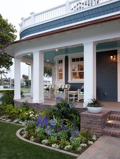 the front porch is decorated in blue and white