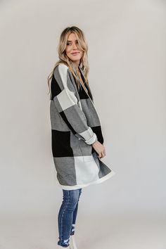 This is guaranteed to be your new favorite cardigan. A cozy knit with black & white windowpane plaid, a stretchy body and oversized fit- what else could you want?! Stretch: triple stretch // TTS for an oversized fitMaterial: 50% viscose, 30% polyester, 20% nylon Model is wearing a size Small & XL Oversized Plaid Casual Cardigan, Oversized Casual Plaid Cardigan, Casual Oversized Plaid Cardigan, Casual Plaid Sweater For Layering, Oversized Plaid Spring Cardigan, Oversized Plaid Cardigan For Spring, Oversized Plaid Long Sleeve Cardigan, Plaid Cotton Sweater For Fall, Plaid Long Sleeve Sweater For Fall