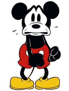 the mickey mouse is wearing red and yellow shoes with his hands in his pockets as if he